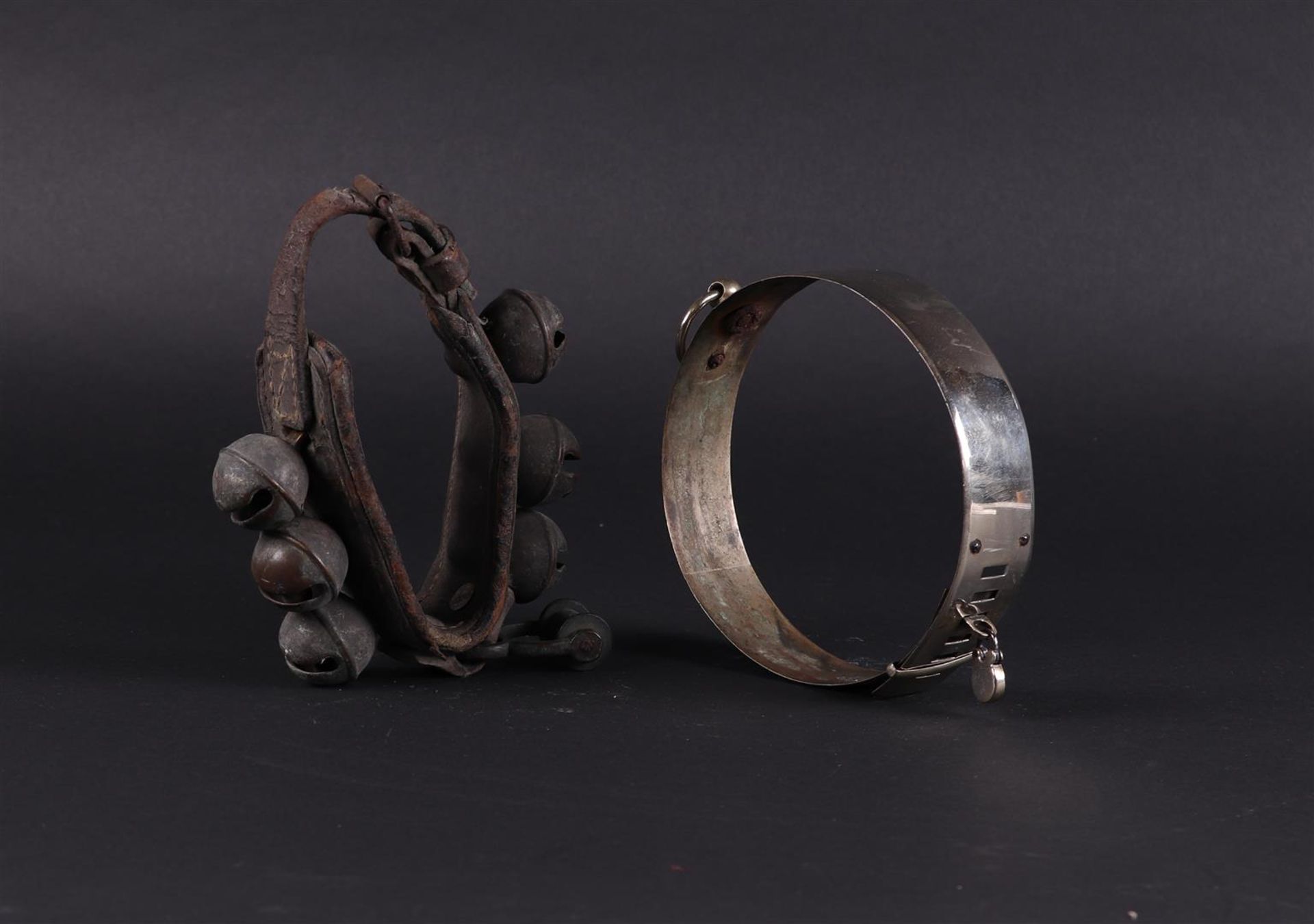 A lot consisting of (2) antique dog-collars.