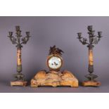 A late 19th century marble clock set , comprising a mantel clock and two candlesticks.