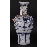 A porcelain replica "lost treasure" knob vase