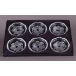 A set of (6) crystal Val St Lambert coasters in etched crystal depicting fruit, in original box.