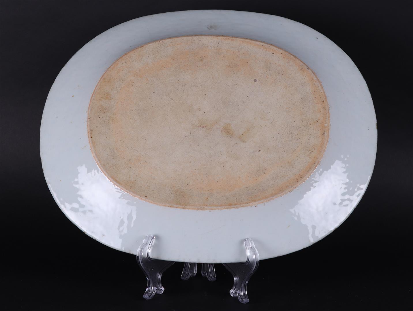 An oval porcelain dish with floral decoration on the interior and with scroll decoration - Image 2 of 2