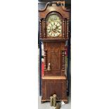 An English grandfather clock with ship mechanism,