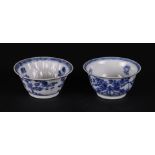 Two various porcelain bowls, both with rich floral decoration, and both marked. China, Kanxi.