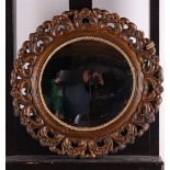 A so-called butler mirror, with convex cut glass. circa 1920.