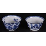 Two various porcelain bowls, both with flower beds decoration, one with bird decoration.