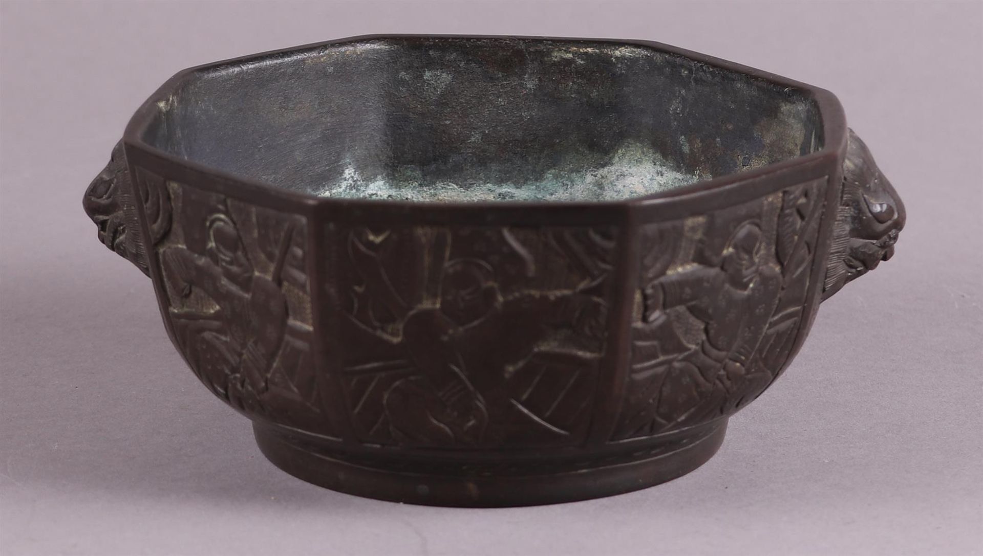 A bronze incense burner decorated with various figures. China, 19/20th century.
