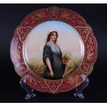 A polychrome porcelain plate with a portrait of the Prophet Ruth, marked Royal Vienna.