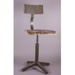 A vintage sculptor's chair with adjustable seat, marked Ets E. Zeeuws & Fils.