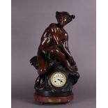 A French mantel clock with clock image after Jean-Baptiste Pigalle (1714 - 1785),