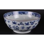 A large porcelain bowl with various scenes and flowers. China, Qianlong.
