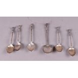 A set of silver spoons including one of Napoleon. 66 grams.