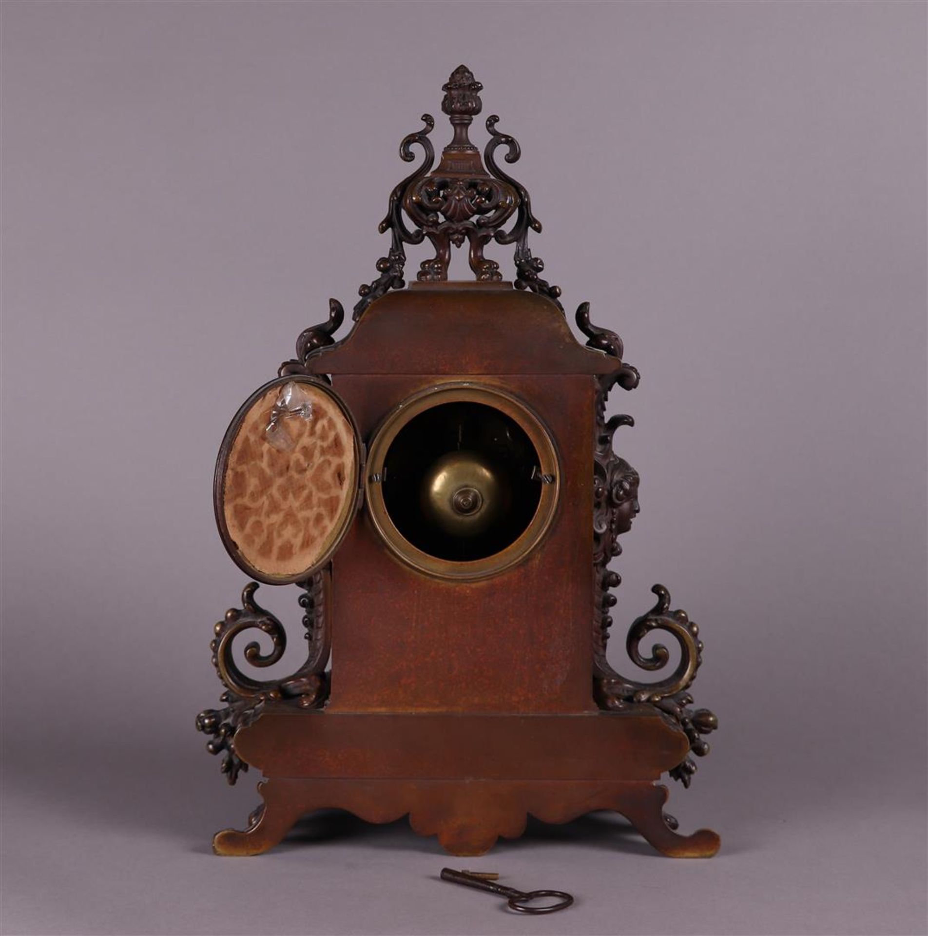 A heavy bronze mantel clock with matching key, ca. 1880. - Image 5 of 5