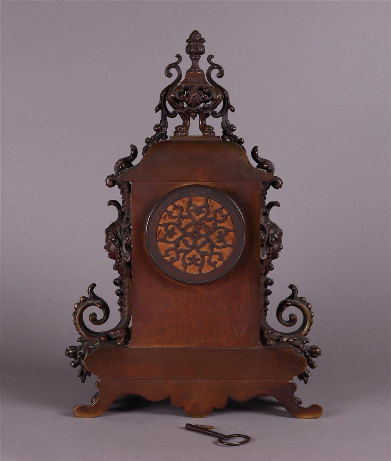 A heavy bronze mantel clock with matching key, ca. 1880. - Image 4 of 5