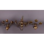 A set of two brass wall chandeliers and a crown. Circa 1900.