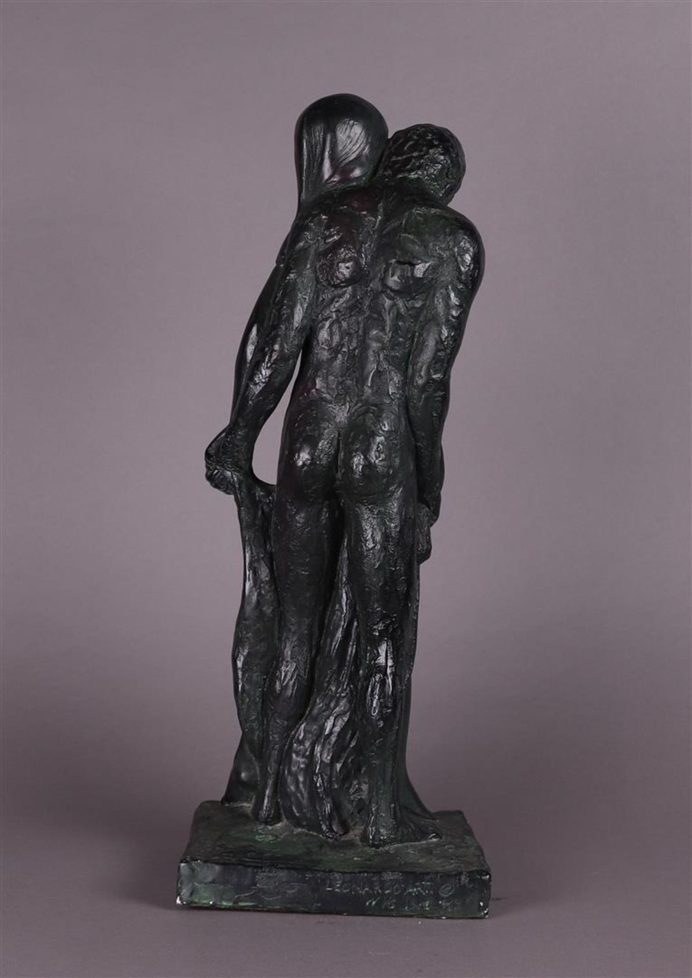 A patinated plaster sculpture of a man and woman in an embrace.  - Image 4 of 4