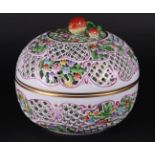 A porcelain openwork chestnut basket with lid with fruit-shaped knob. Herend