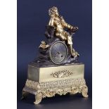 A bronze partly fire-gilt mantel clock with a boy on a rock