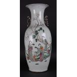 A porcelain Famille Rose vase decorated with various figures. China, 19th century.