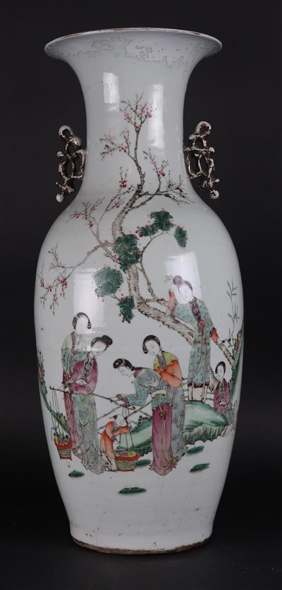 A porcelain Famille Rose vase decorated with various figures. China, 19th century.