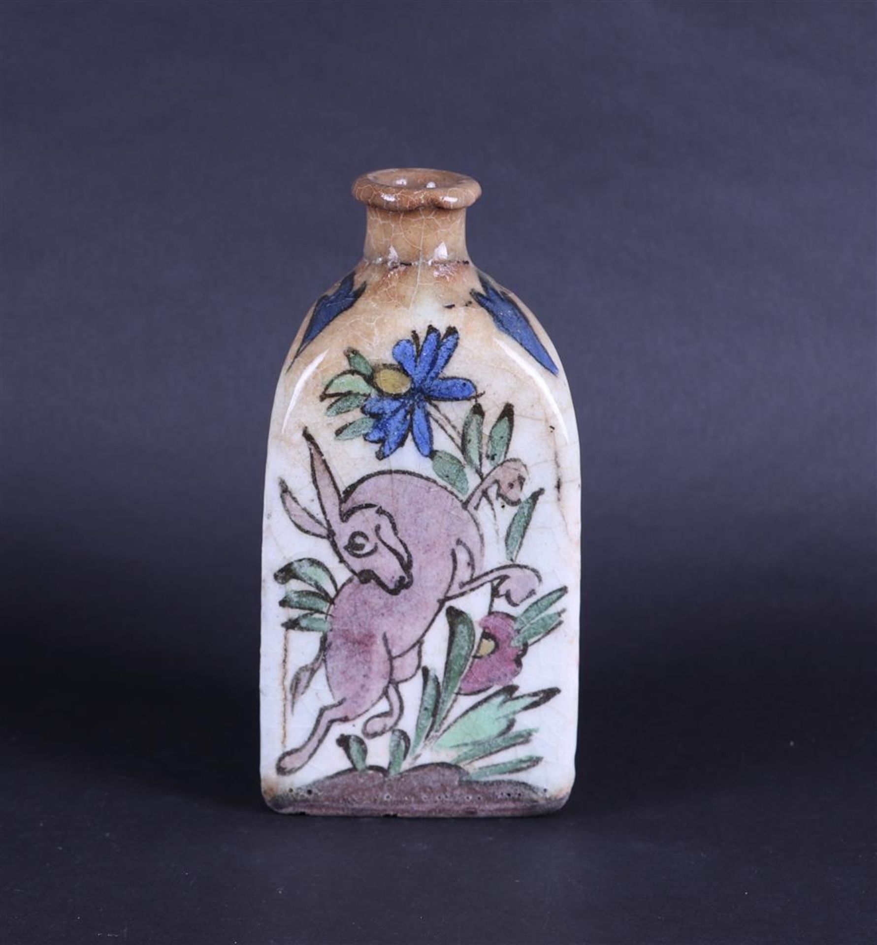 A Qajar pottery bottle decorated with decor of animals and plants. Persia, 19th century. - Image 3 of 4