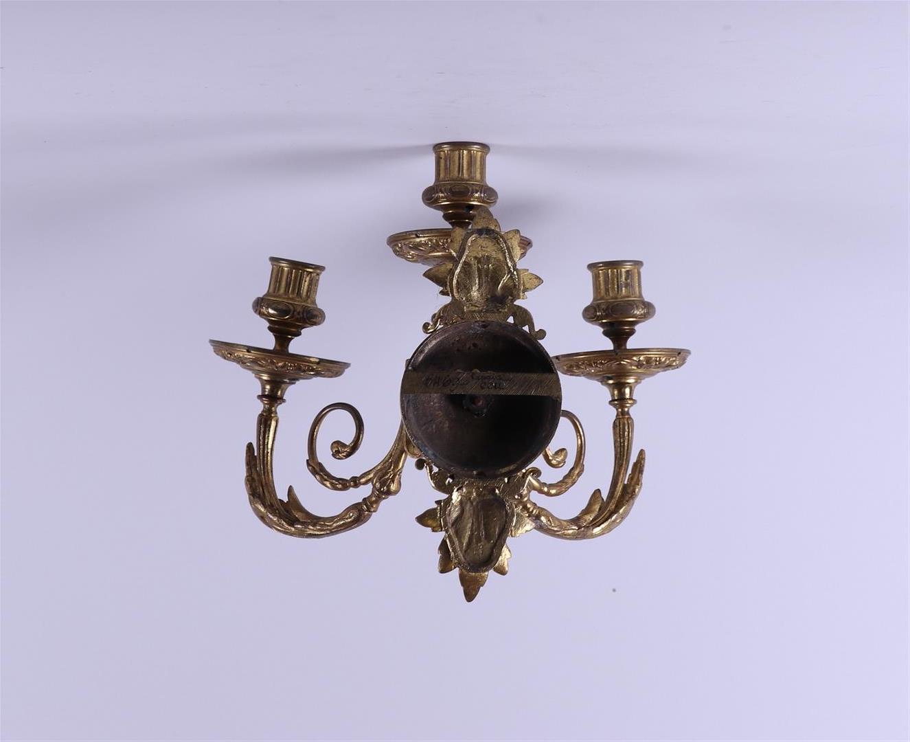 A brass three-armed wall chandelier.Ca. 1900. - Image 2 of 2