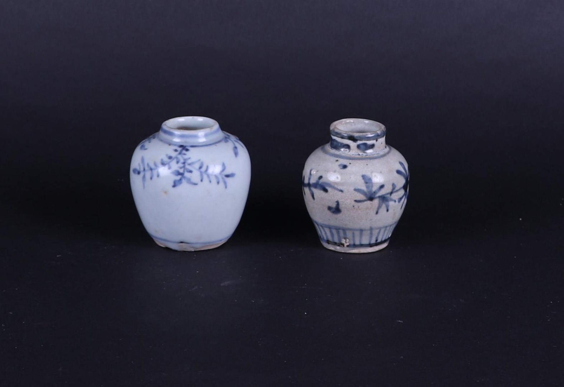 Two small porcelain storage jars with floral decoration. China, Ming period.