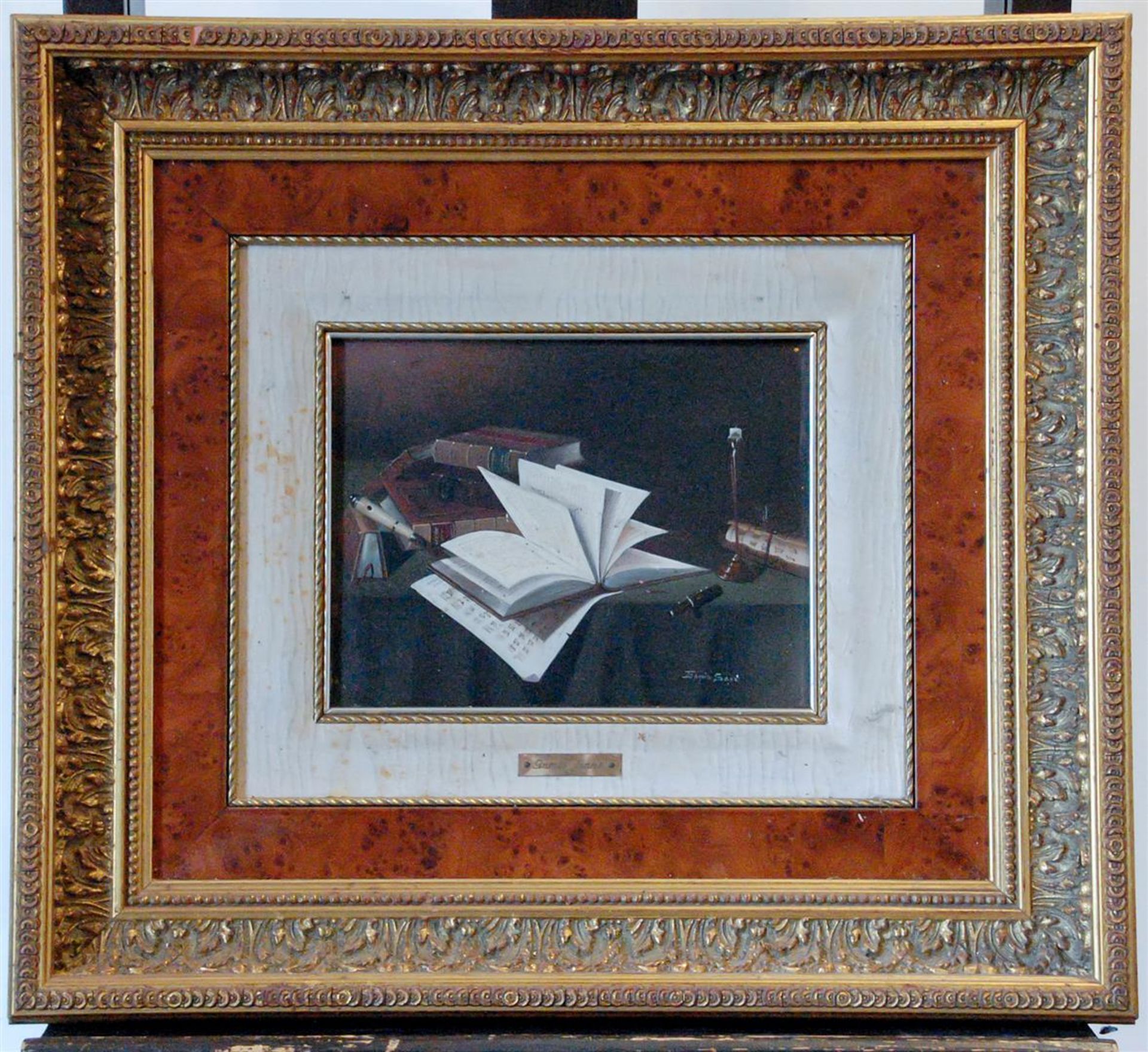 Gamiz Sanz, 20th century. A decorative painting depicting a still life of books, oil on panel.