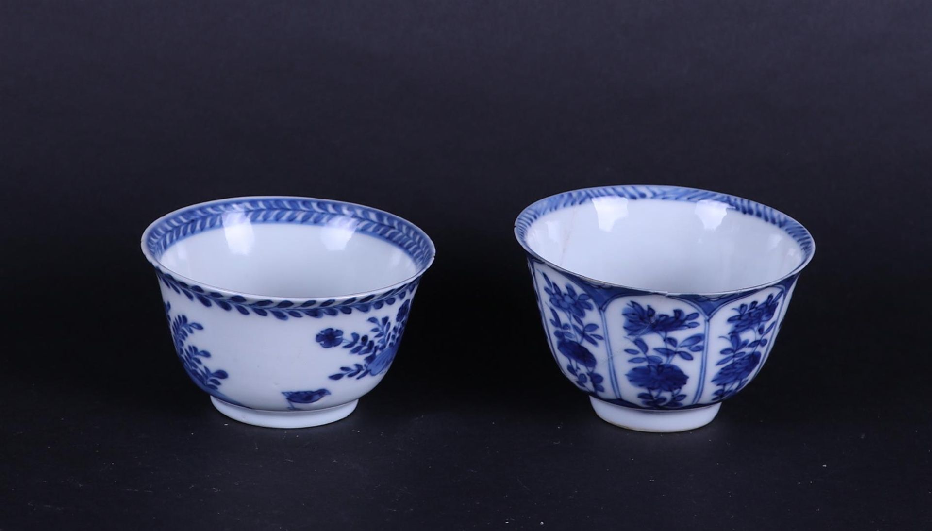 Two different porcelain bowls, one with a pavilion decor, the other with flower beds. China, 