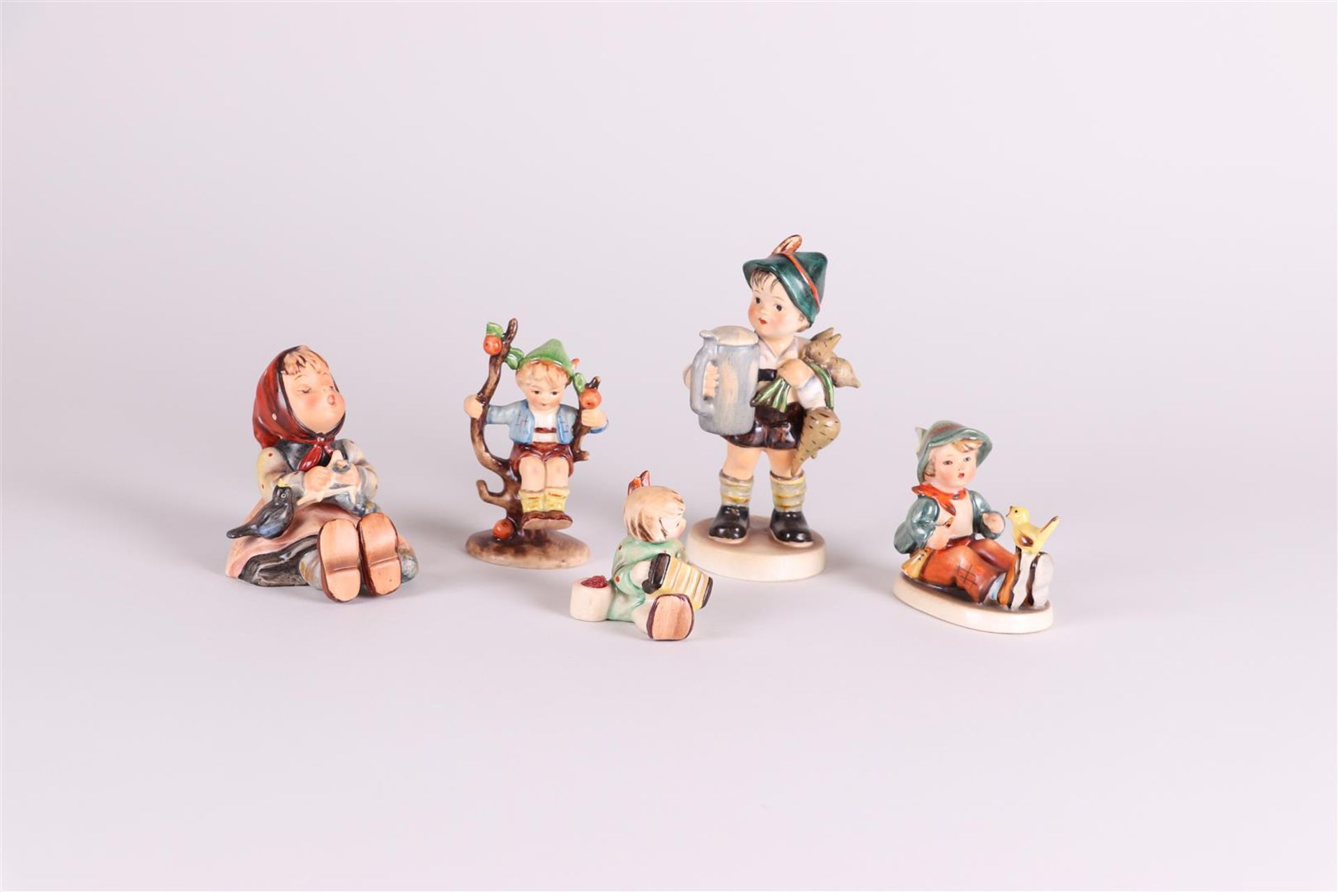 MI. Hummel, a lot of (5) figurines, all marked Goebel.