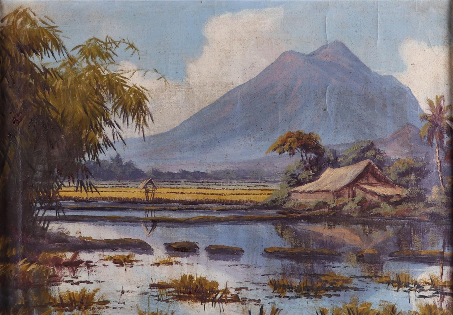 Indonesian school, ca. 1930, Sawa landscape with volcano, oil lon canvas laid down on panel, .