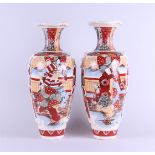 A set of two Satsuma earthenware vases decorated with various figures. Japan, circa 1900.