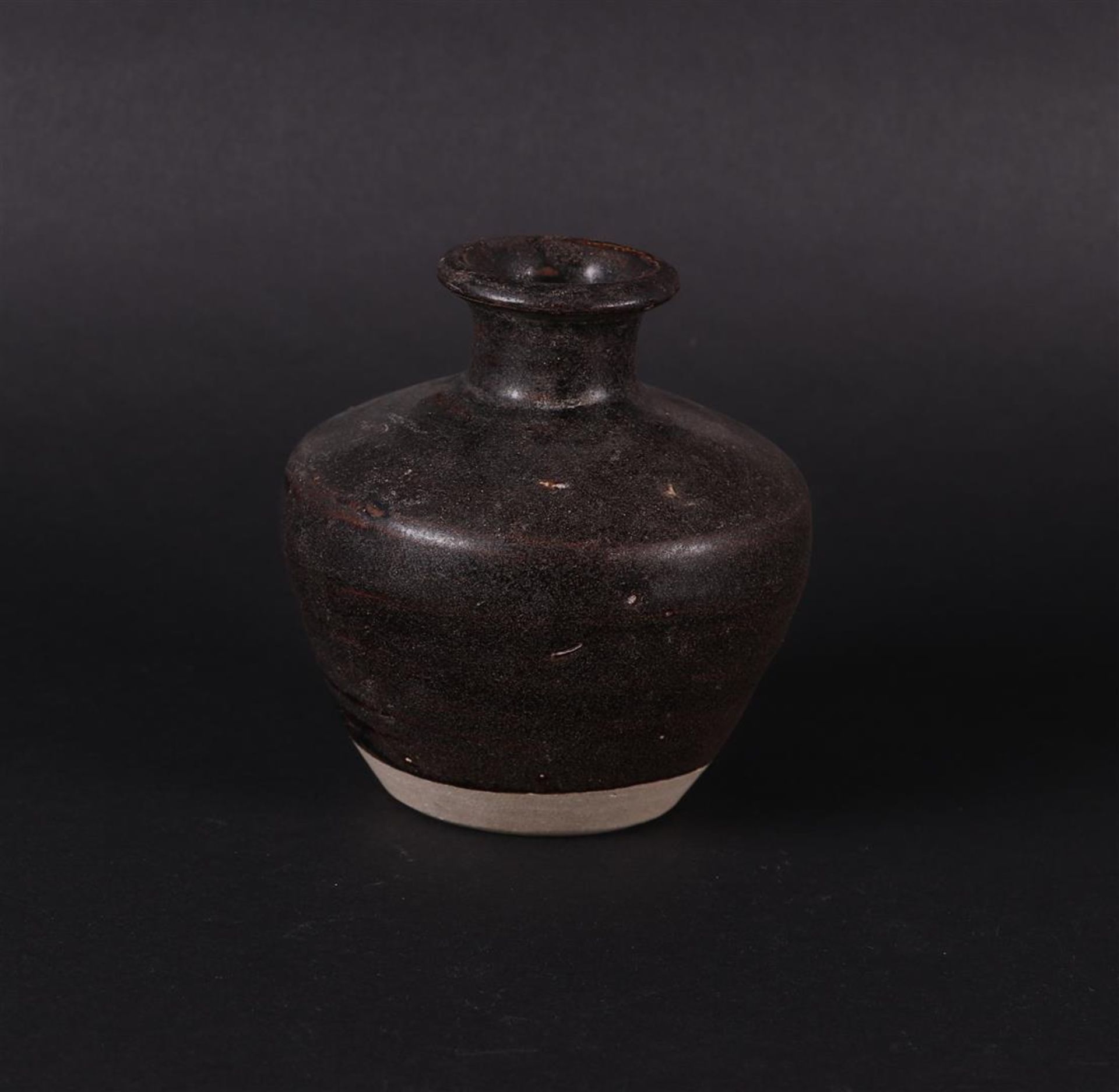 A large stoneware storage jar, dark grey. China early Ming. - Image 2 of 4