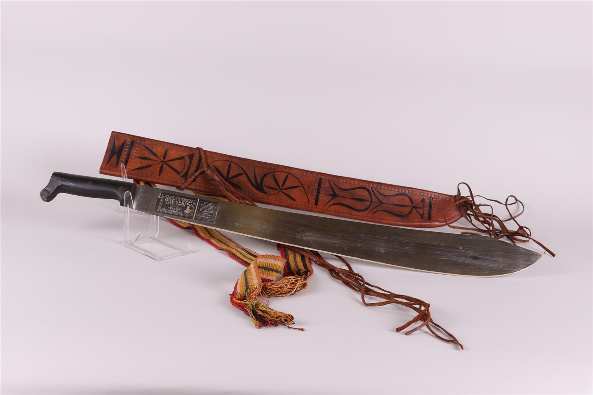 A machete  in a  leather sheath, South America. 20th century.