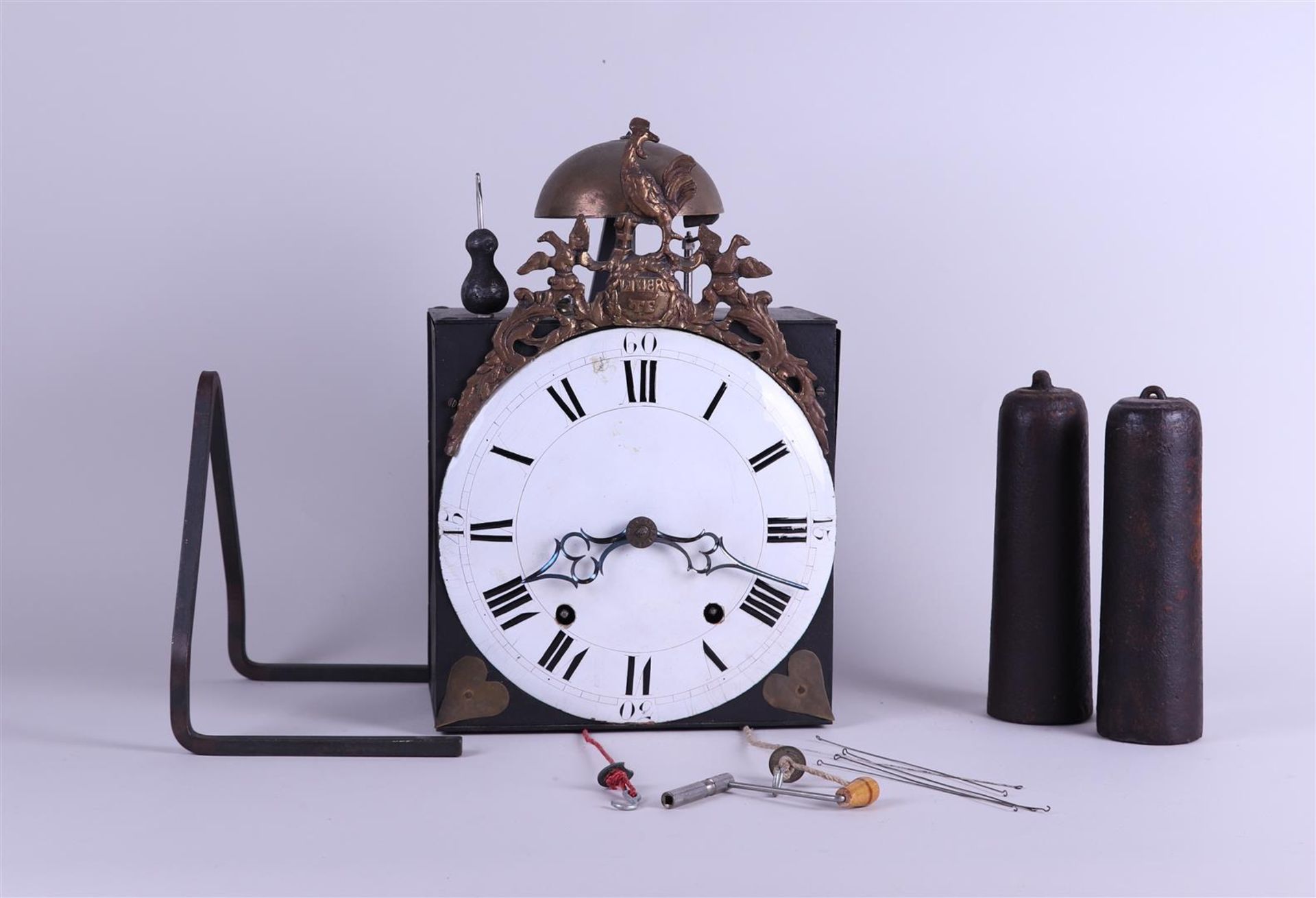 A comptoise clock, so-called "Haantjesklok", France, first half of the 19th century. 