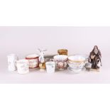 A lot with various European porcelain consisting of miscellaneous cups, saucers and figurines.