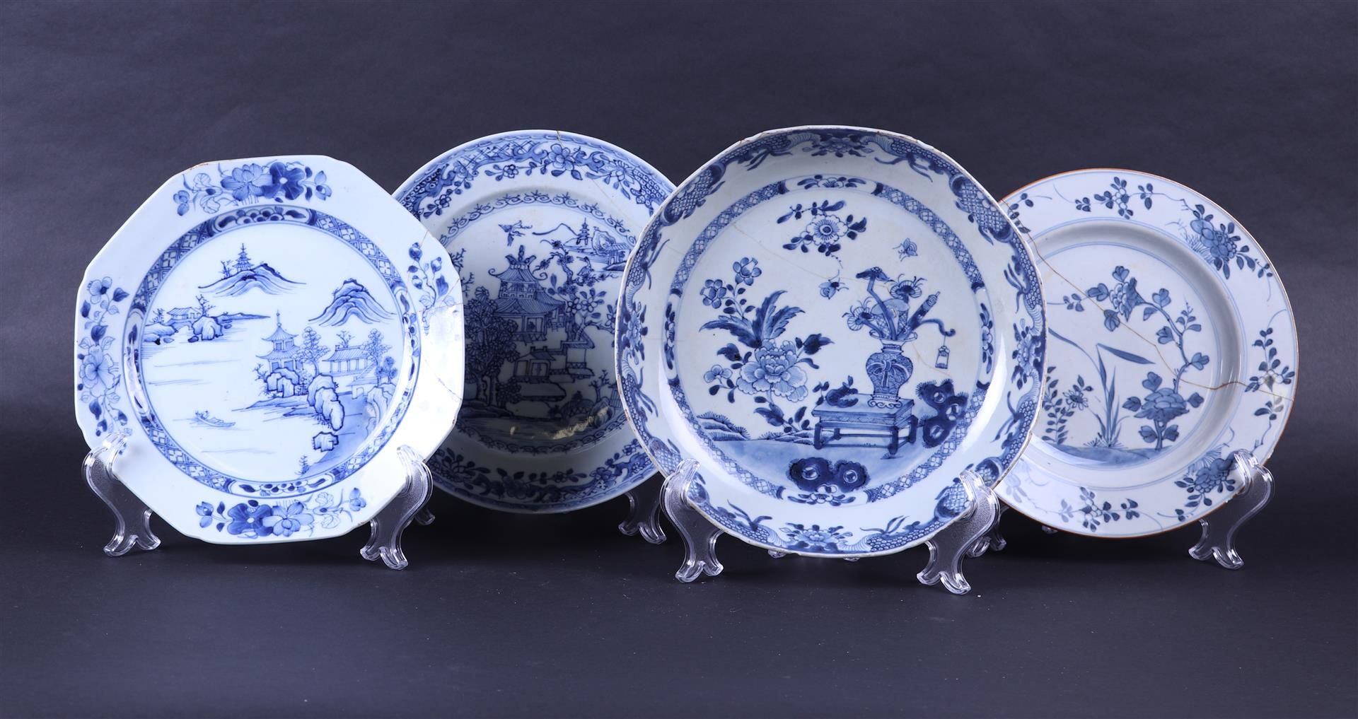 A lot of four porcelain plates with various decors. China, 18th century.