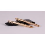 A gold-plated pen set in leather case Waterman. Marked in the edge.