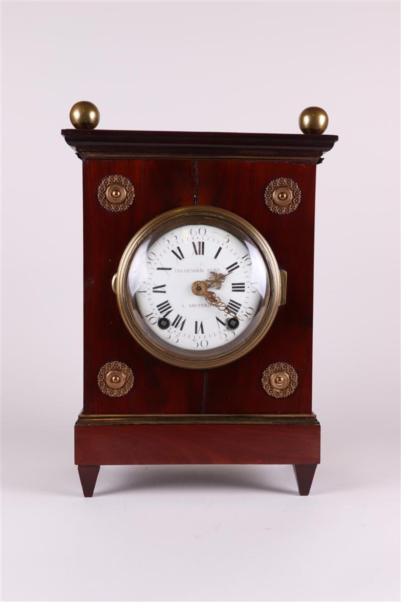 A mahogany glued Louis XIV mantel clock, addressed Jan Hendruk Kuhn Amsterdam. J