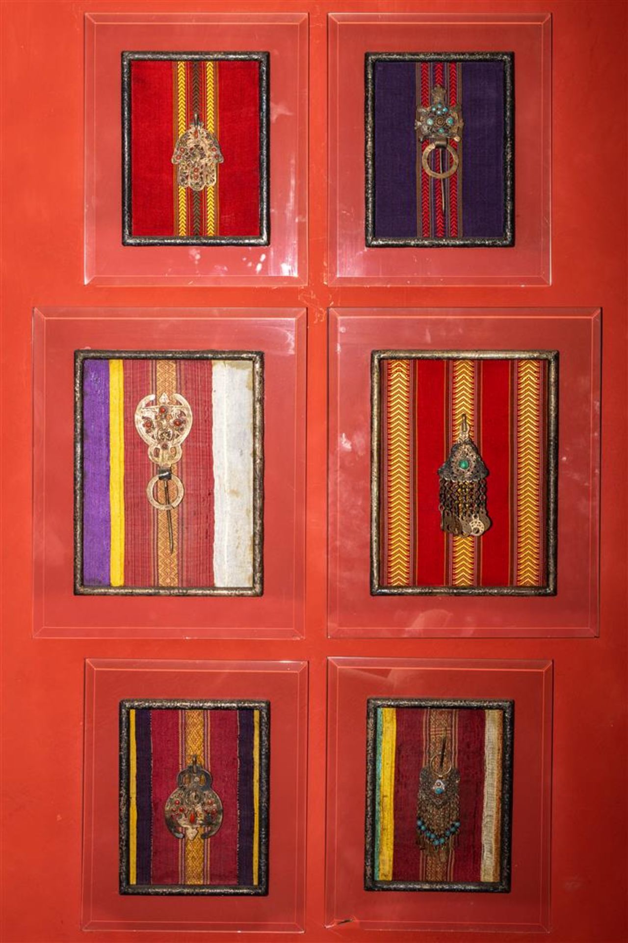 A lot consisting of (6) white metal pendants with base stones, India, 19th century.