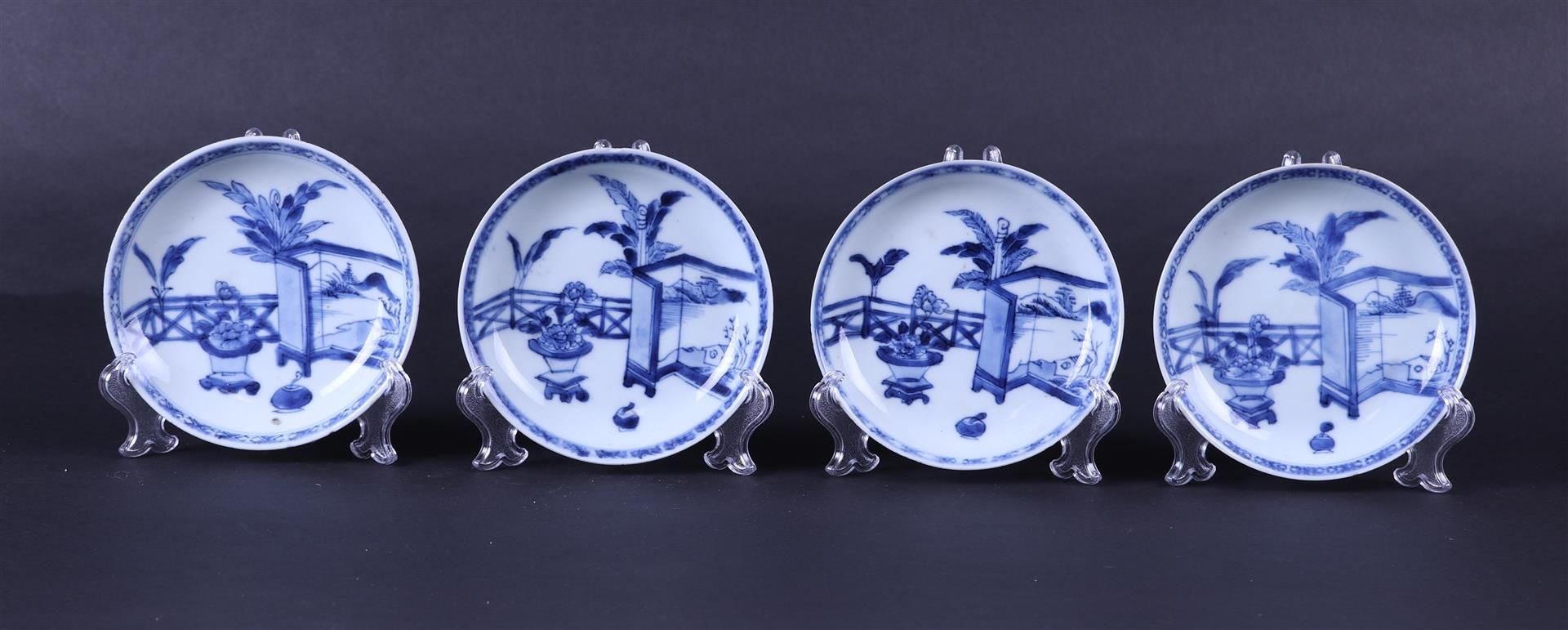 A set of four porcelain plates decorated with a folding screen. China, Kangxi.