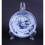 A porcelain deep dish with rich floral decoration of lotus / peony and bamboo decor.