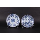 Two porcelain deep plates, both with floral decor, one with a capuchin back. China Qianlong.