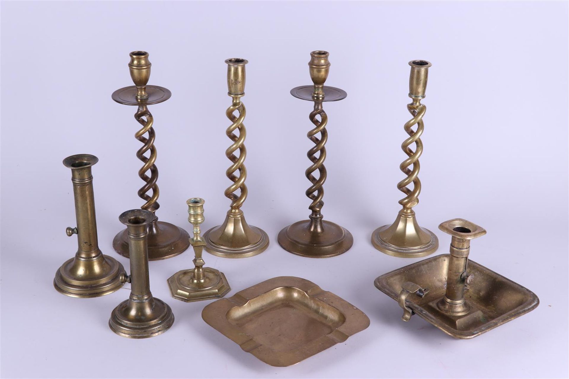 A lot of various copper candlesticks. 19th century.