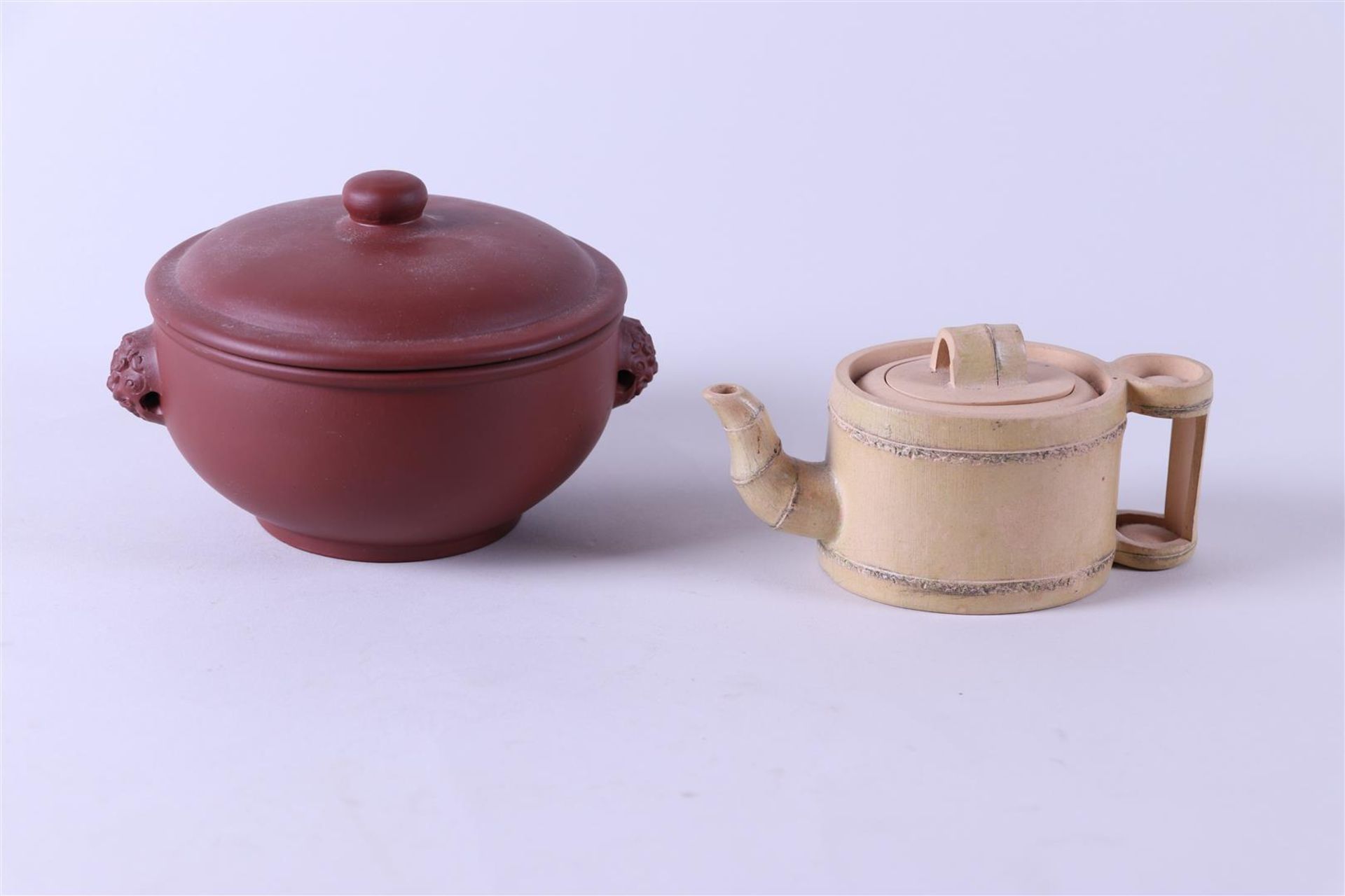 A Yixing lot consisting of a pull pot and a hot pot. China, 20th century.