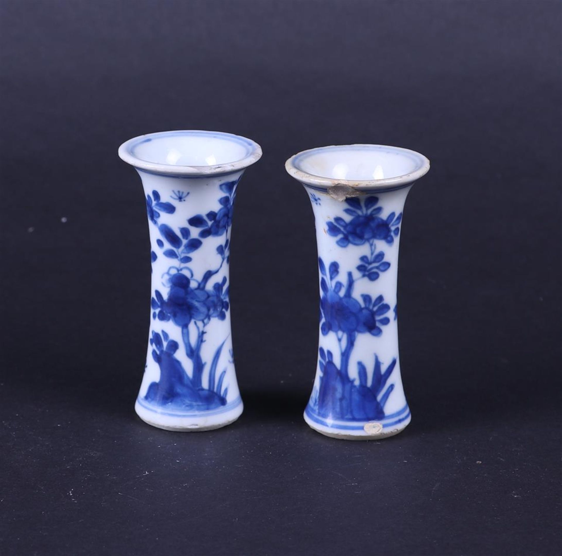 Two porcelain beaker vases with floral decor. China, Kangxi.