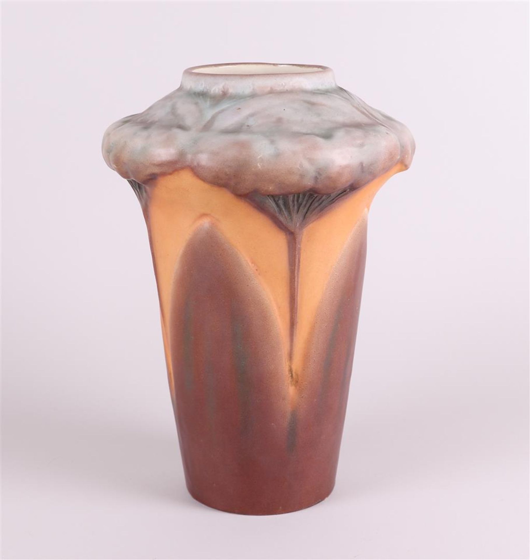 An earthenware Art Noveau vase with floral motifs. France, early 20th century.