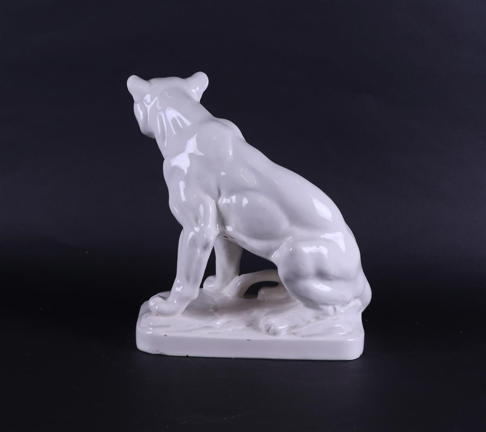 A white pottery "Art Deco" cast piece of a lioness. Germany(?), early 20th century. - Image 3 of 4