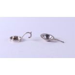 A lot of two tea strainers. Silver 68 gr.