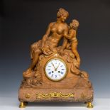 A terra cotta clock depicting Venus and Adonis, the movement fitted with strings, France ca. 1840.