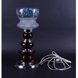 A vintage table lamp with glass shade, marked Jamar.